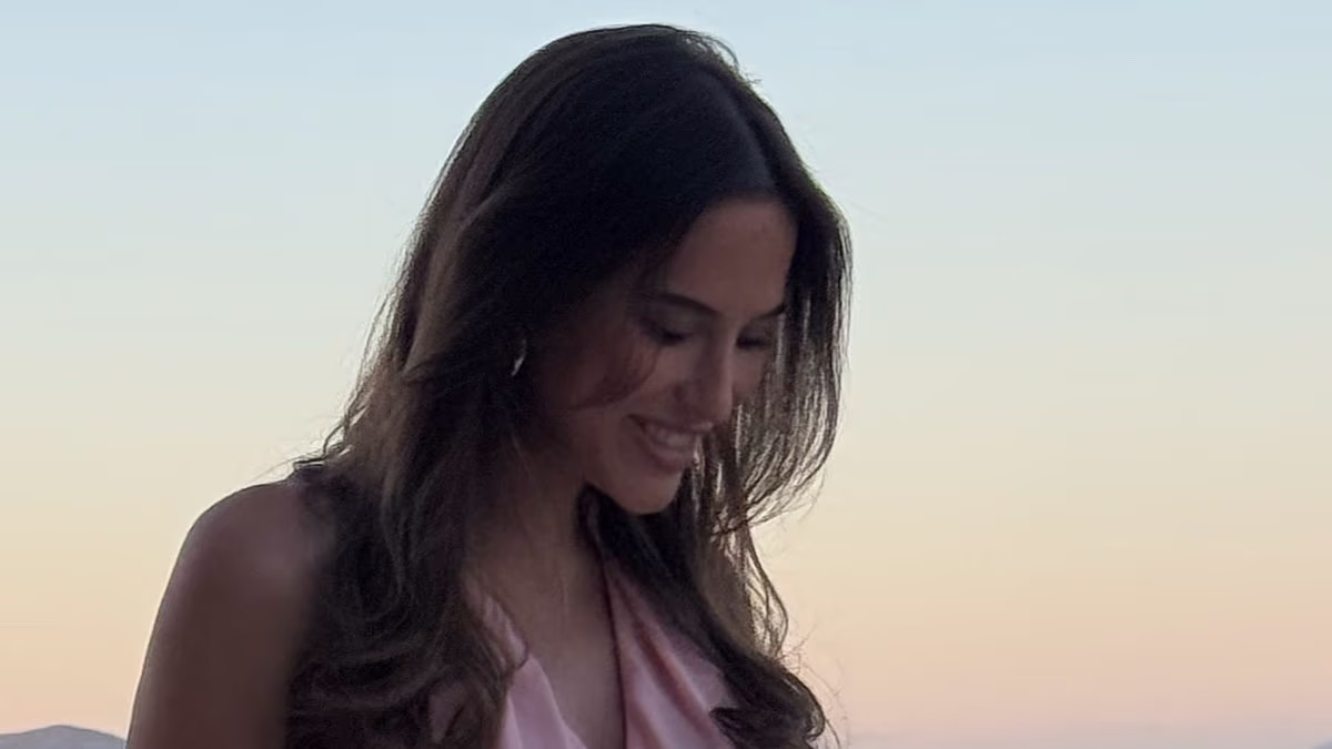 Pregnant Lucy Watson shows off her baby bump as she reveals the gender of her second child in sweet family holiday snaps