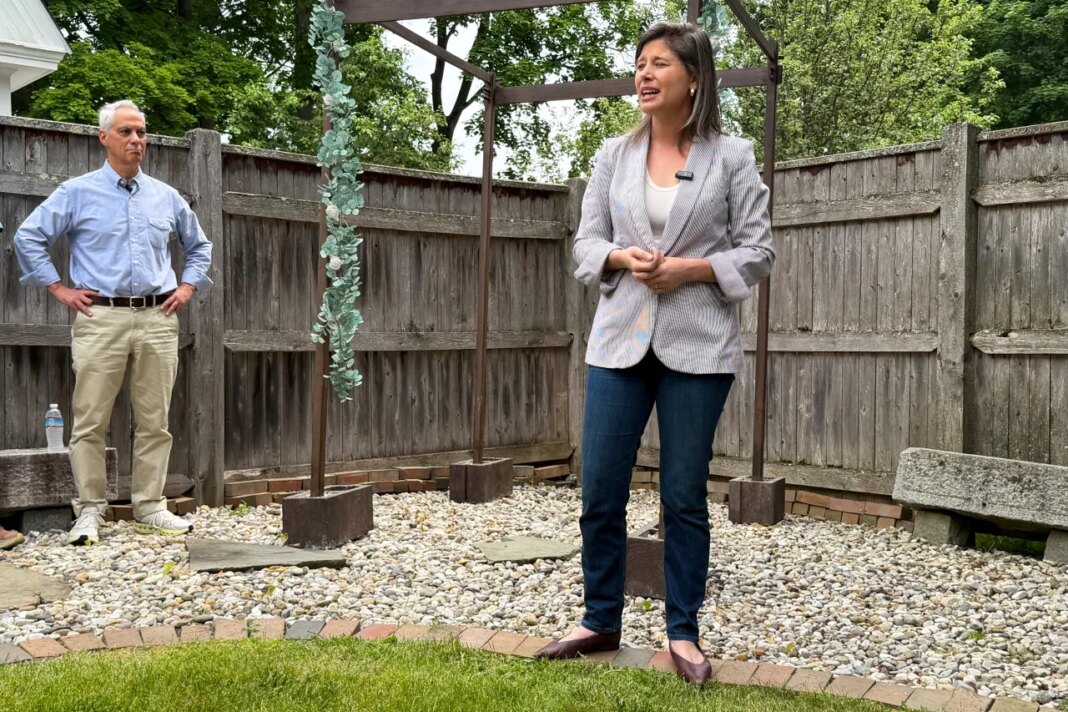 Rep. Maggie Goodlander speaks alongside Rahm Emanuel at a house party in Concord, N.H., Saturday, June 6, 2026. (AP Photo/Steven Sloan)