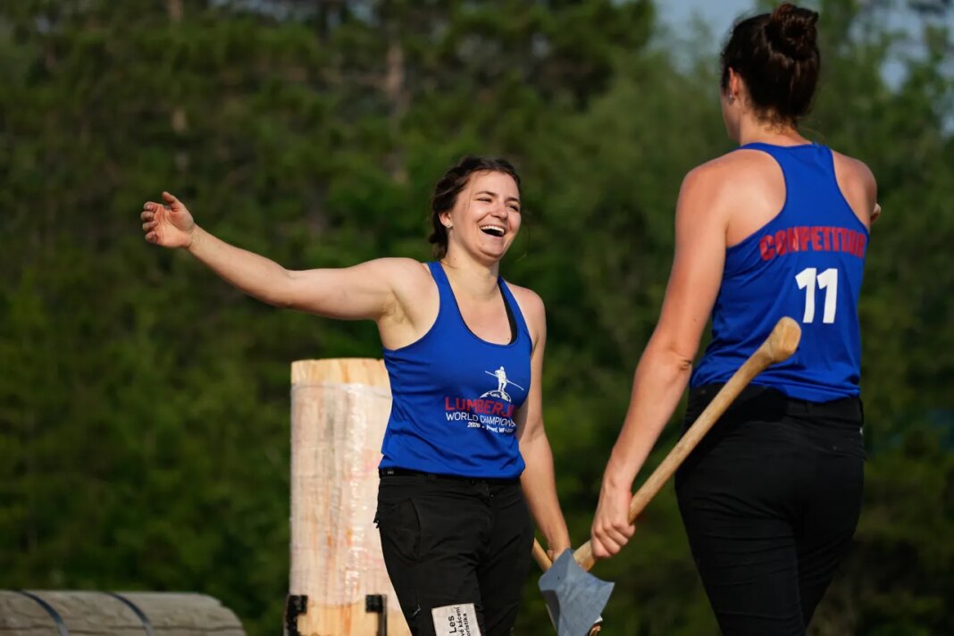 Karolina Urbanová, of the Czech Republic, and Stephanie Naud, of Canada, celebrate after Urbanovà broke the world record in the women