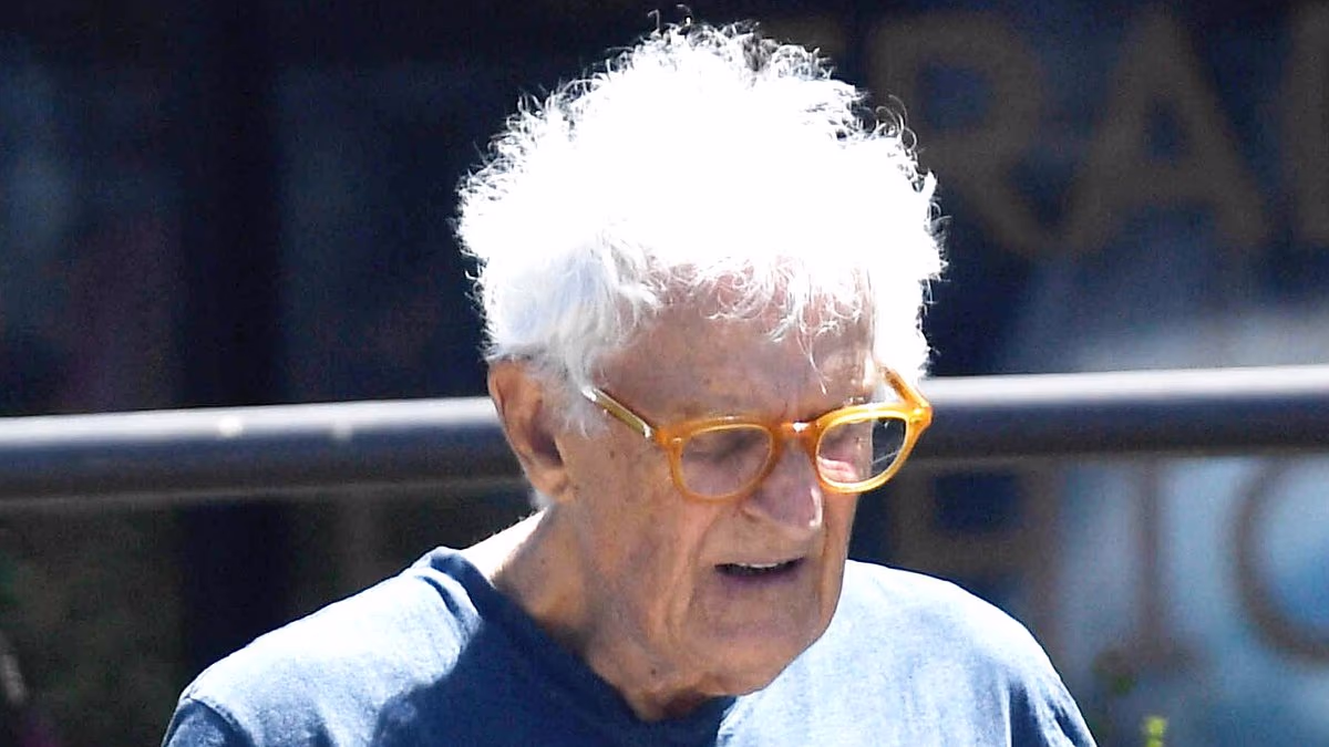 70s star and director steps out for rare outing... can you guess who?