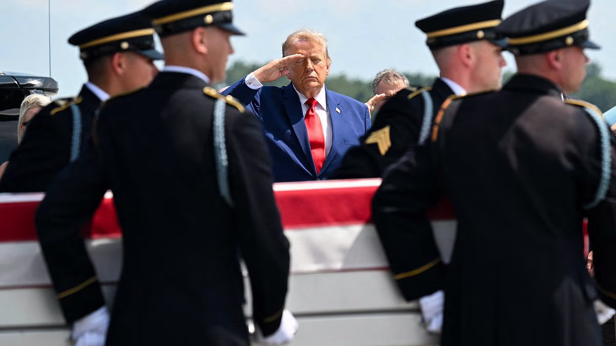 Grim ceremony at Dover as Trump meets coffins of American soldiers