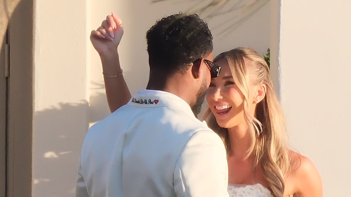 JuJu Smith-Schuster's bride Laura Kruk looks stunning in her own wedding gown a week after humiliating dress snafu at Taylor Swift's ceremony