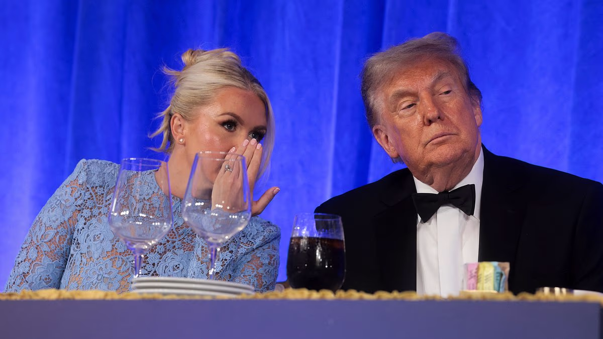 Karoline Leavitt comforts Trump as he's forced to sit through dig