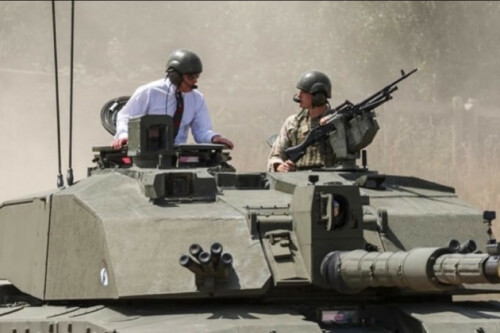 King Charles takes tank ride as Prince Harry fires fresh blows at Royal Family