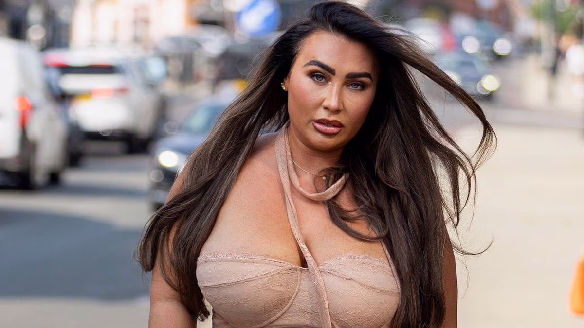 Lauren Goodger slips into a strapless top as she films TOWIE