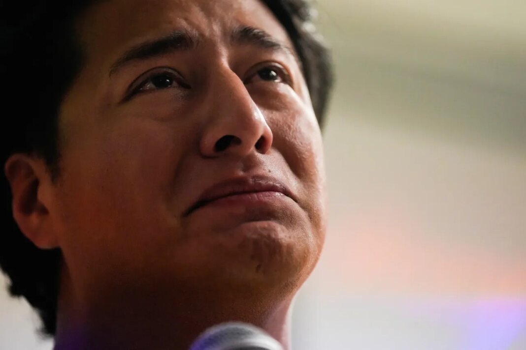 Ronaldo Salgado, the son of Lorenzo Salgado Araujo, speaks during a community vigil honoring his father in Houston on Saturday, July 11, 2026. (Raquel Natalicchio/Houston Chronicle via AP)