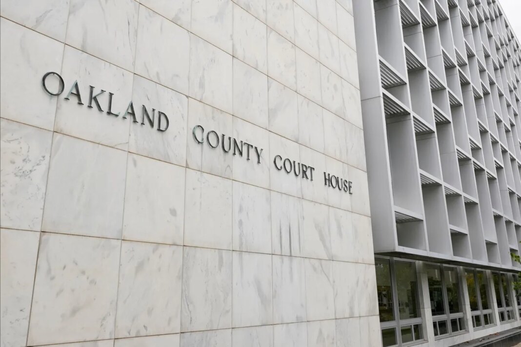 FILE - An Oakland County Courthouse building is shown in Pontiac, Mich., Oct. 19, 2020. (AP Photo/Paul Sancya, File)