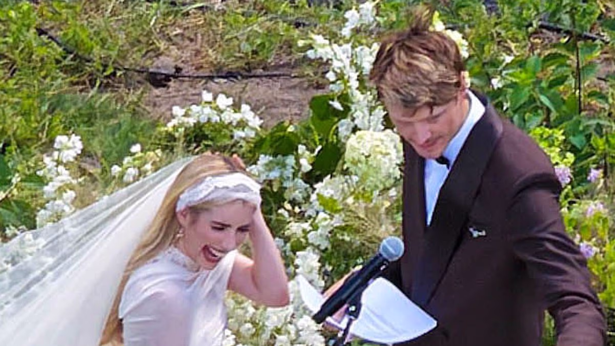 PICTURED: Emma Roberts wows in stunning gown as she weds Cody John