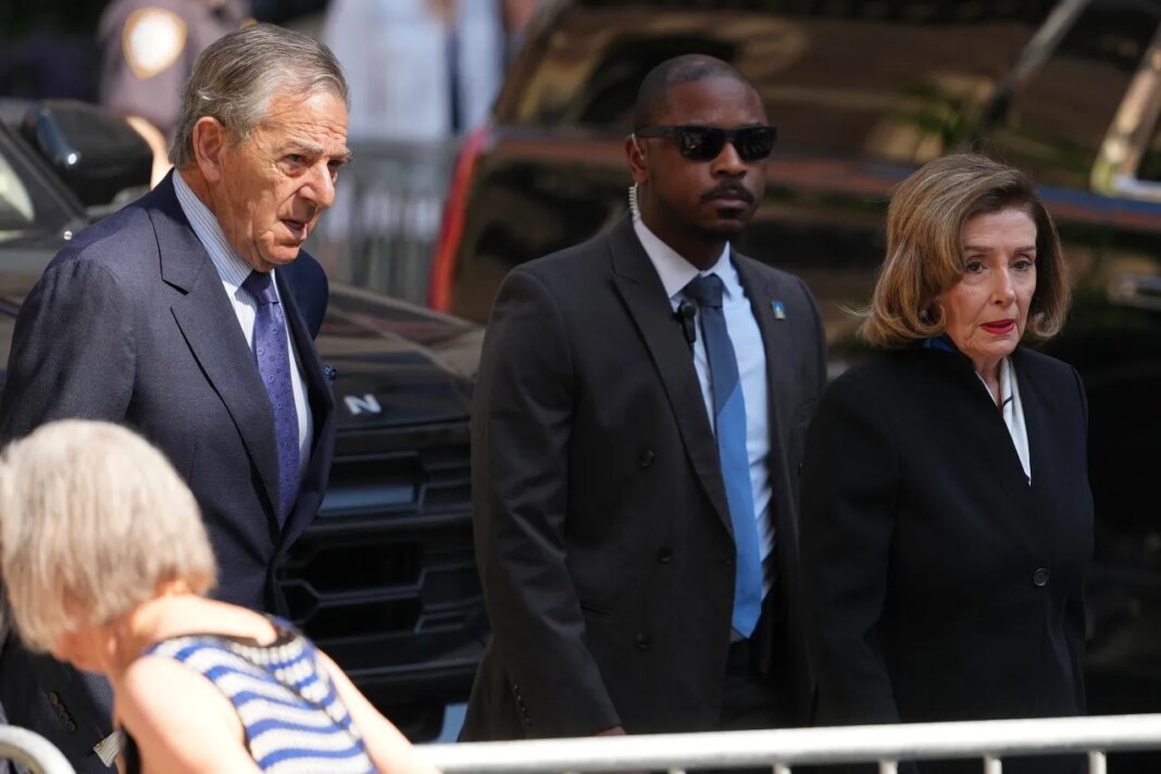 Rep. Nancy Pelosi, D-Calif., and her husband Paul arrive at the funeral services for Clive Davis at Central Synagogue in New York, Monday, June 29, 2026. (AP Photo/Adam Gray)