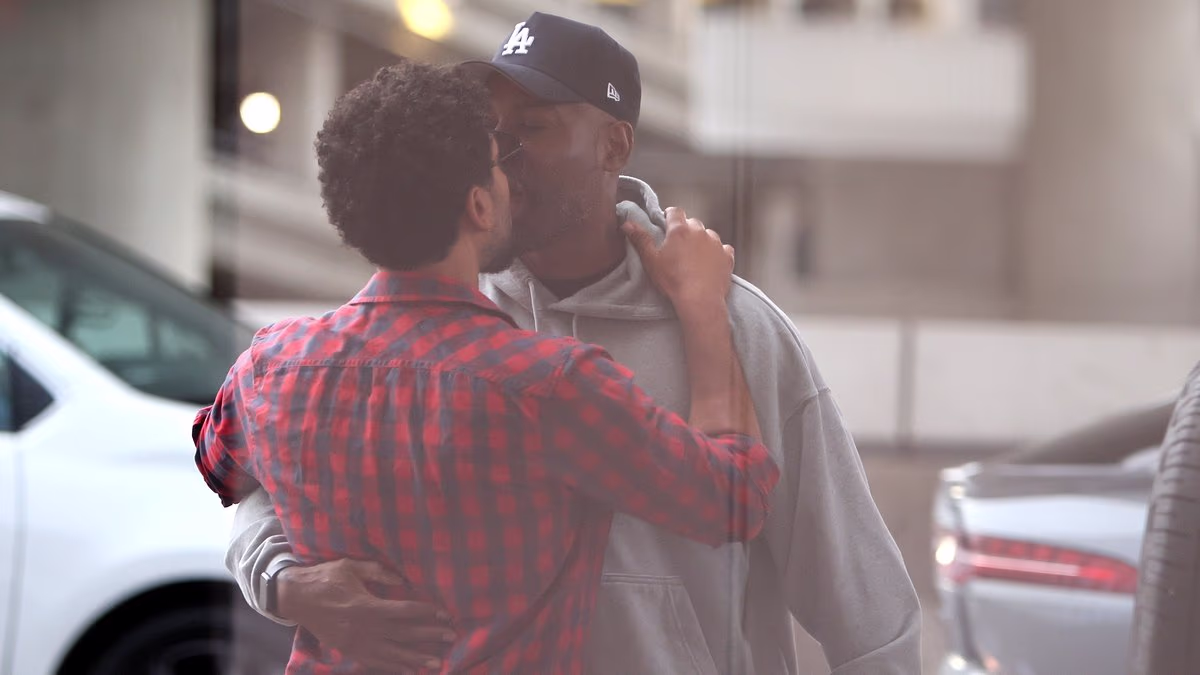 Queer Eye star Karamo Brown passionately kisses Jussie Smollett