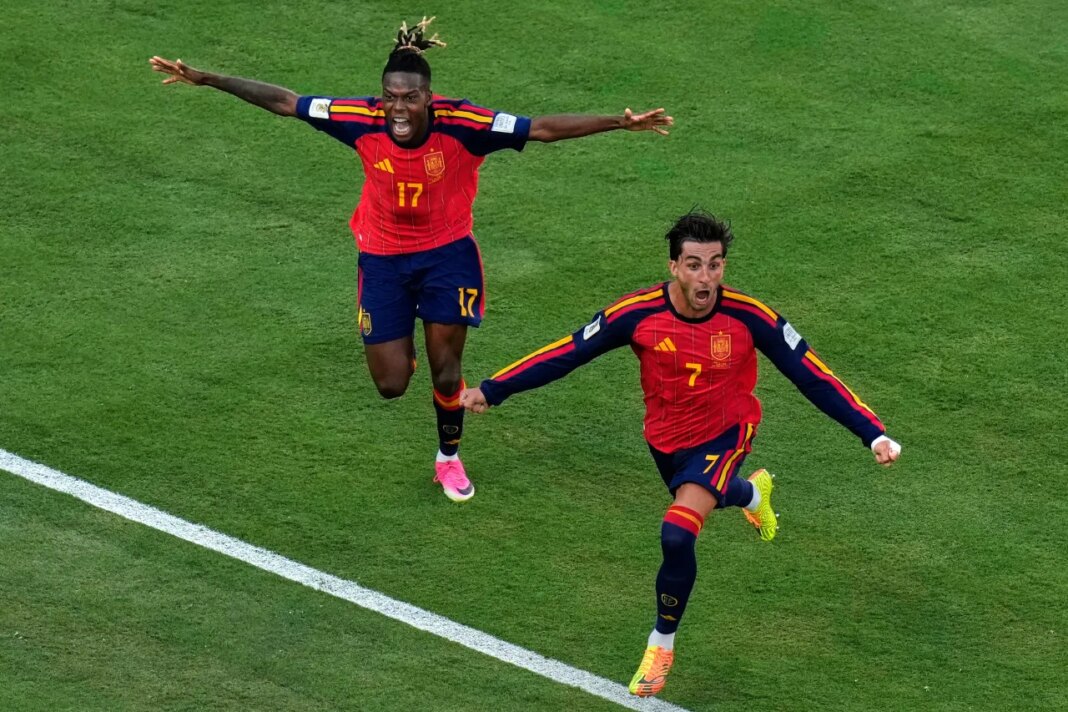 Spain's Ferran Torres (7) celebrates after scoring the opening goal of his team during the World Cup final soccer match between Spain and Argentina in East Rutherford, N.J., near New York, Sunday, July 19, 2026. (AP Photo/Seth Wenig)