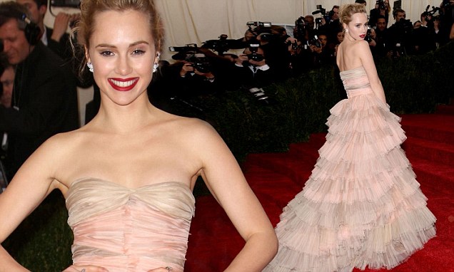 Suki Waterhouse turns heads in frilly pink dress at Met Gala