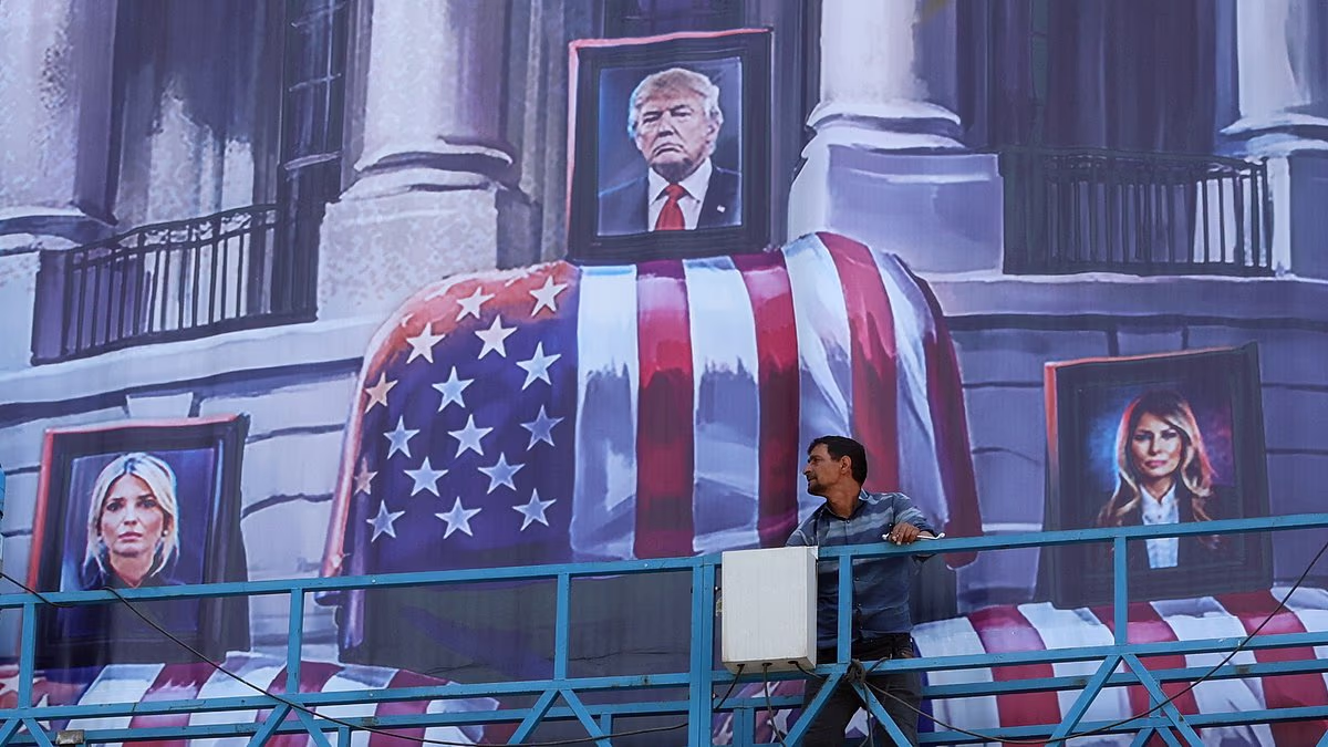 Tehran unveils banner of Trump family as US airstrikes hit Iran
