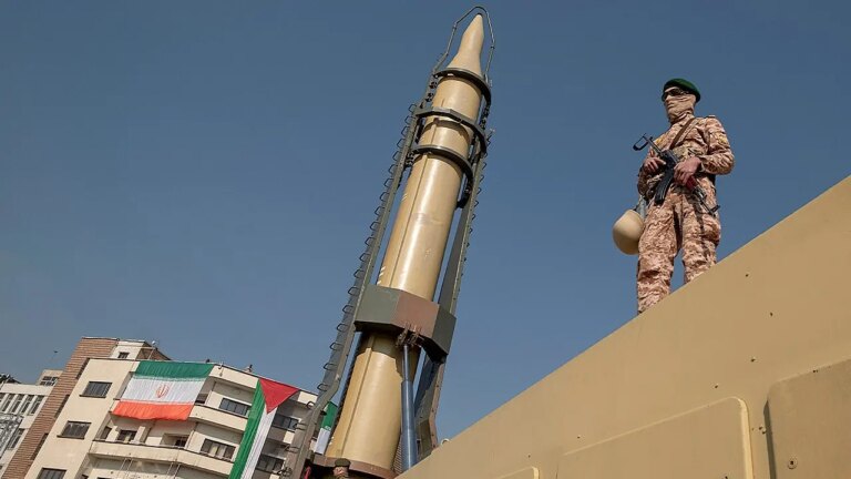 Iran Unveils New Missile, Urges for Land Invasion Amid Decades-Long War Readiness