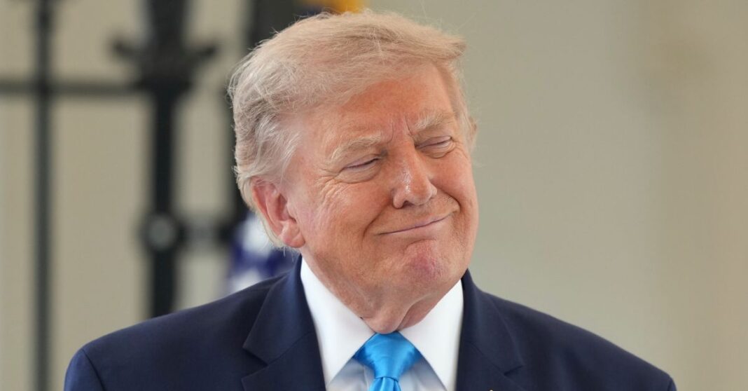 Donald Trump wearing a blue tie.