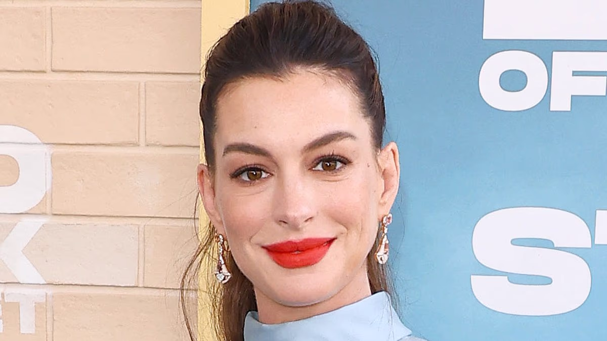 Anne Hathaway, 43, hits back at trolls who claim she is FAKING her pregnancy... after she was roasted over 'ridiculous' maternity outfit