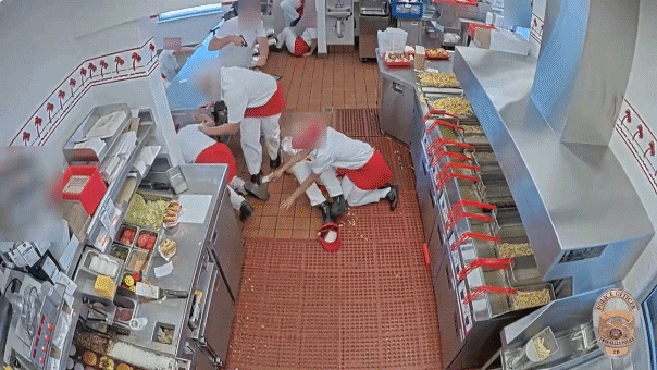 Off-duty Idaho State Police trooper jumps over an In-N-Out counter as the gunman runs outside during the Twin Falls shooting
