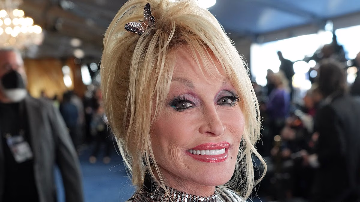 Dolly Parton fans slam Mississippi mayor after he opposes flag gesture