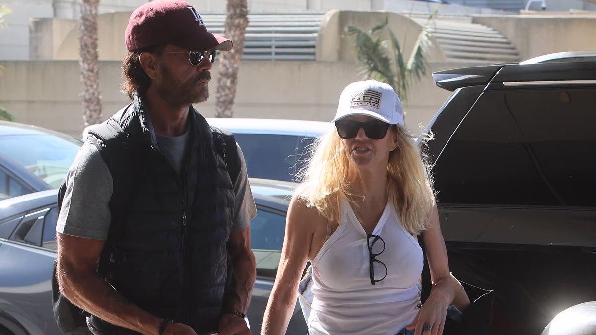 Heather Locklear, 64, and Lorenzo Lamas, 68, look loved-up at LAX