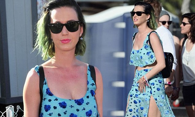 Katy Perry flashes her flat tum as she parties at Coachella