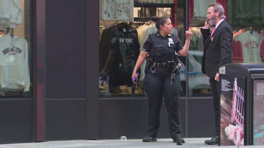Knife-wielding woman accused of stabbing 2 in Times Square before being shot by police