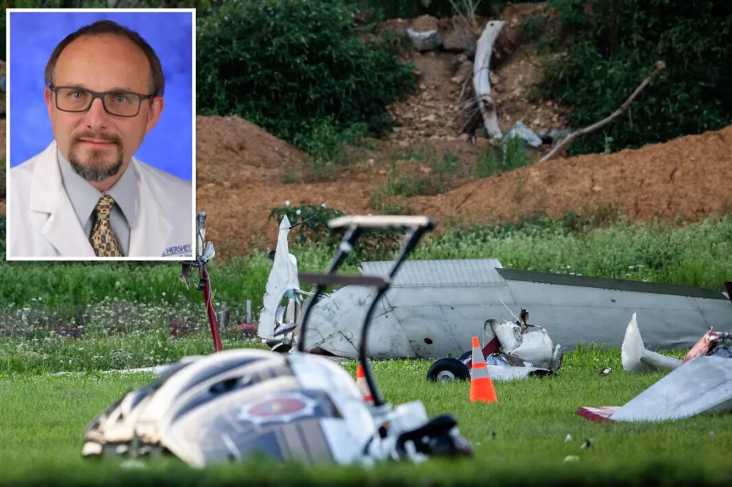 Pilot killed in 'very violent' crash with Pennsylvania State Police helicopter ID'd as ER doctor as 'dramatic' video of collision revealed