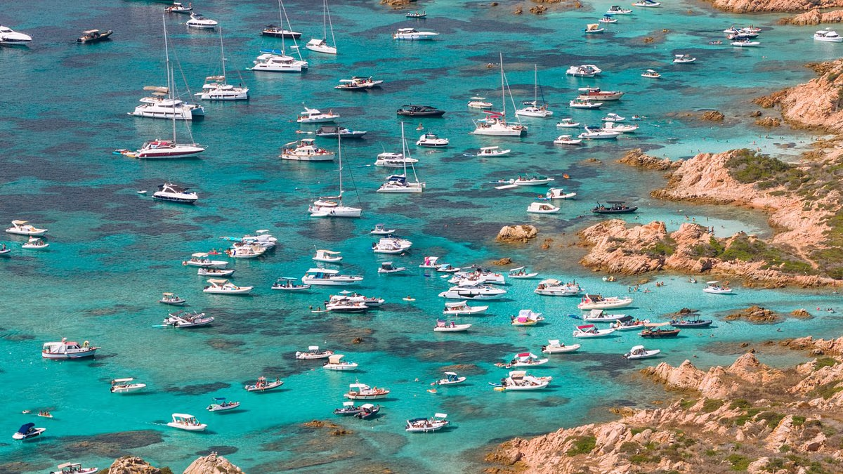 Sardinian Coast Swarmed by Tourist Party Boats: Here’s Why