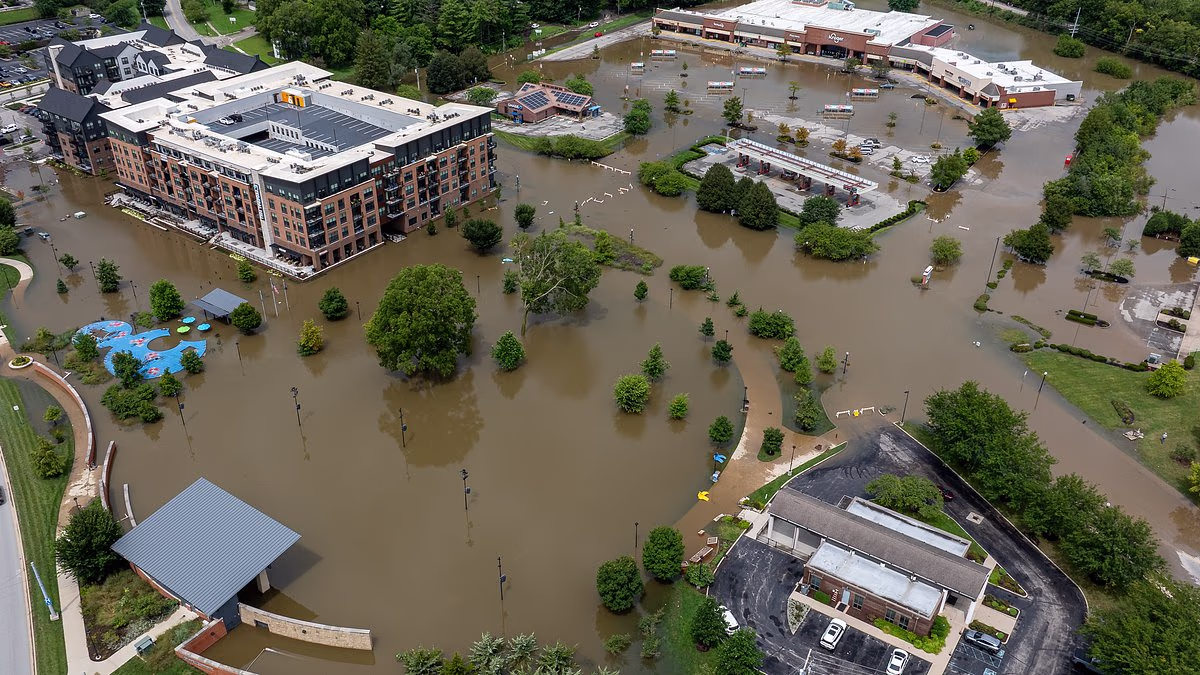 Six dead and 100 rescued in 'once-in-a-lifetime floods' in Indiana