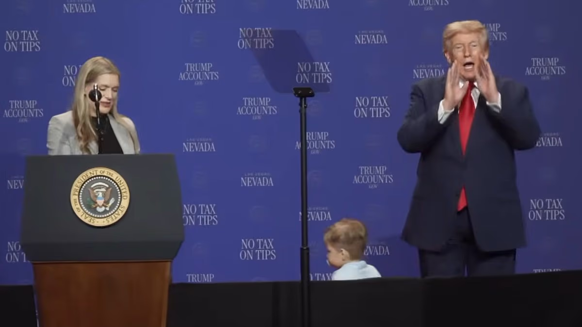 Trump stops toddler from falling off stage while joking about Biden
