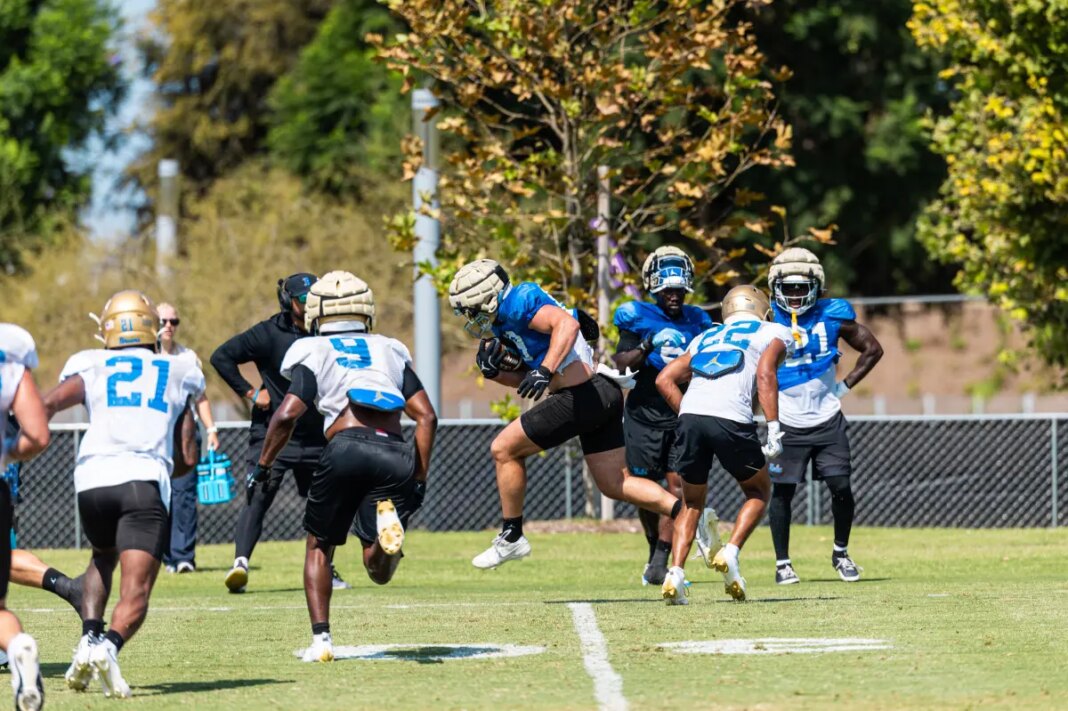 UCLA player is revved up over USC billboard near campus