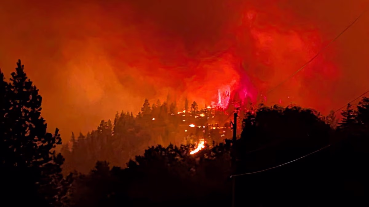 Wildfire that erupted 'like a bomb' causes 20,000 Canadians to flee