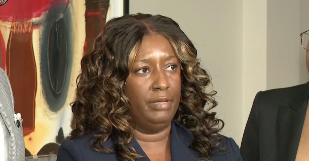 Cassandra Barksdale speaks to reporters about her lawsuit against Kaiser Permanente (WXIA).