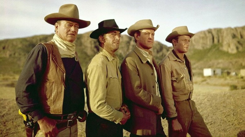John, Tom, Matt, and Bud standing together in 