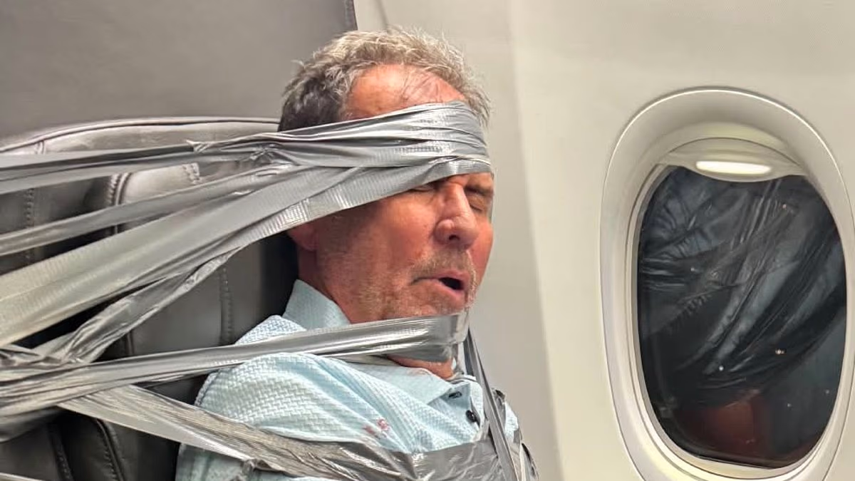 American Airlines passenger who had to be DUCT-TAPED identified