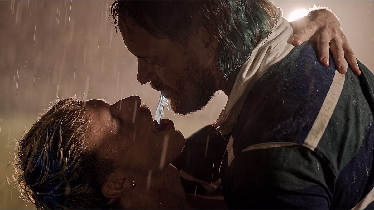 Bisexual AFL star Mitch Brown calls out AFL culture as he kisses male singer in a raunchy new music video