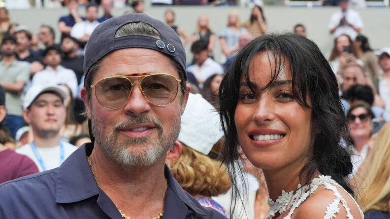 Brad Pitt Goes Full Camo Beside Ines de Ramon’s Mismatched Look