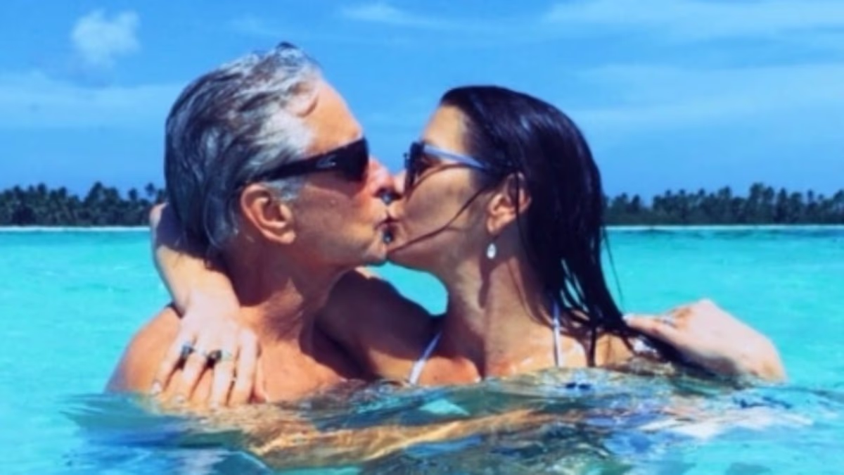 Catherine Zeta-Jones, 57, passionately kisses husband Michael Douglas