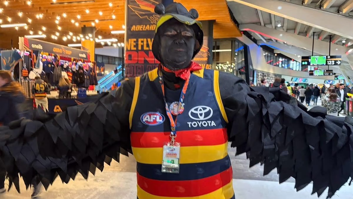 Crows blackface fan unmasked as club stalwart and Superfan of the Year