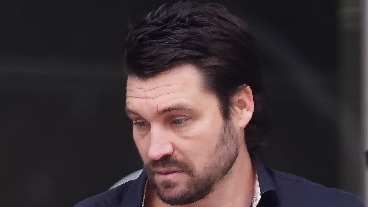 Ex-AFL footballer bashed partner after being upset about Grand Final