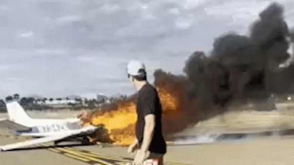 Thick, black smoke billows from fiery plane after deadly plane crash in San Diego, California.