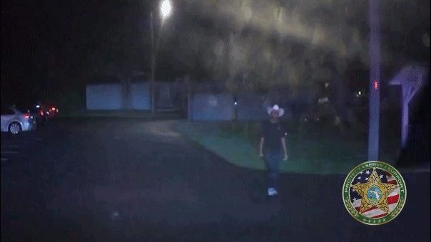 Sword-wielding suspect confronted by police