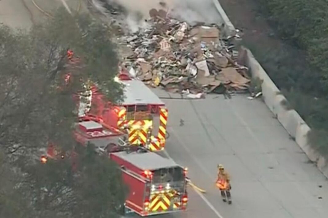 Garbage fire on LA-area freeway closes lanes in Gardena