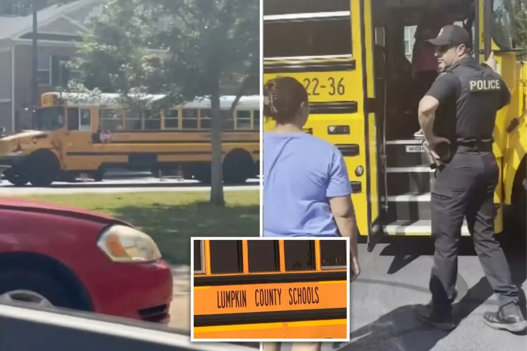 Georgia parents issued arrest warrants for storming school bus after claiming driver locked kids inside without AC