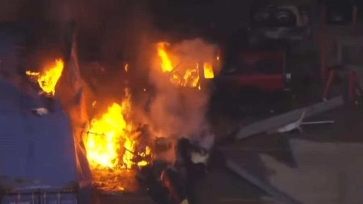 Helicopter crashes and bursts into flames near scene of bus crash