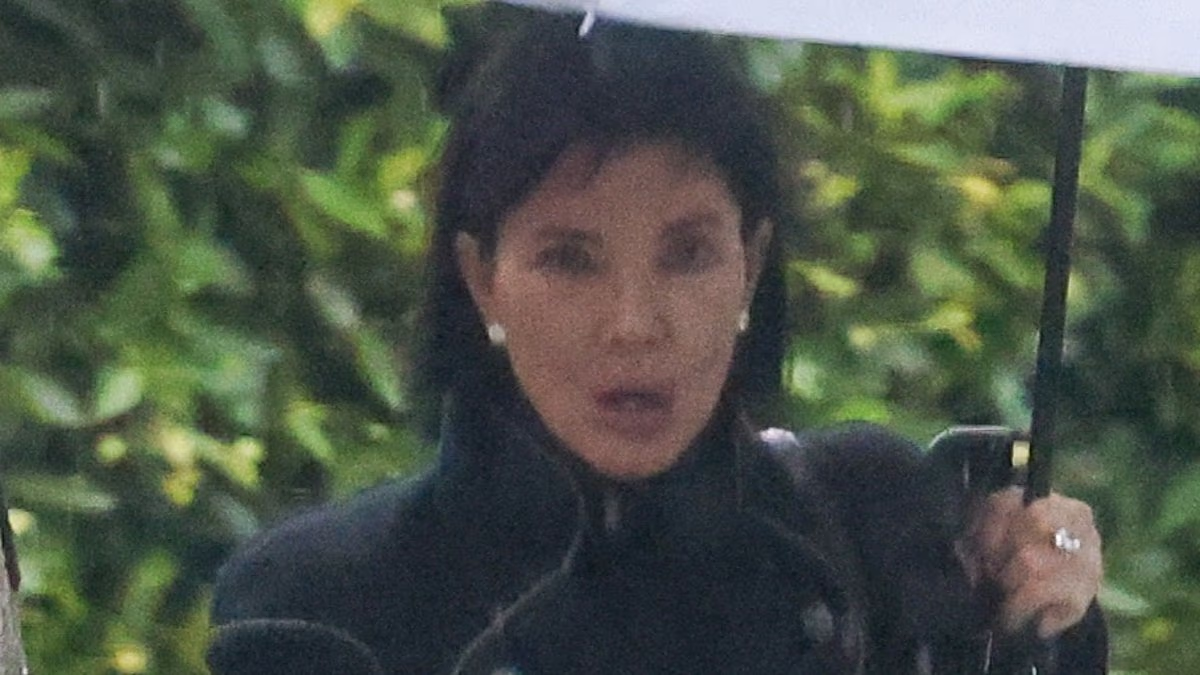 Kris Jenner braves the LA rain in a chic all-black ensemble