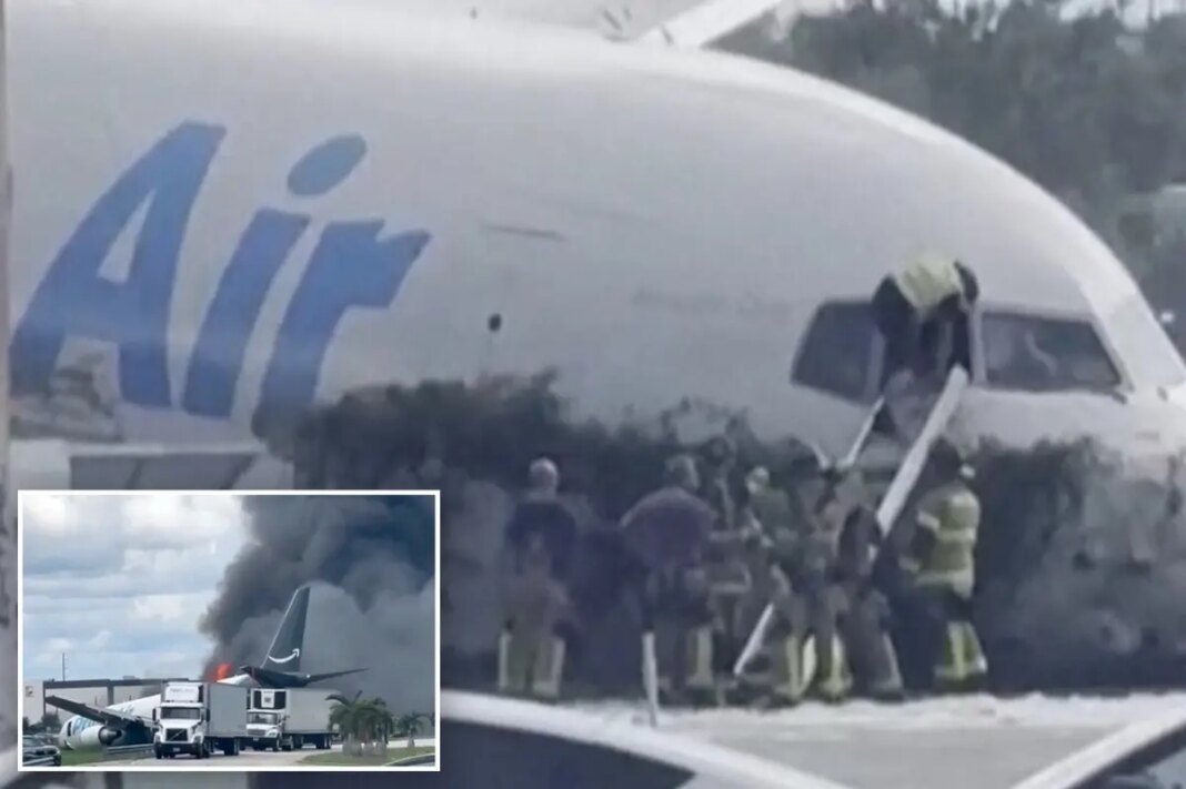 Miami firefighters seen climbing into Amazon cargo jet after shouting on dispatch 'The plane is on fire'