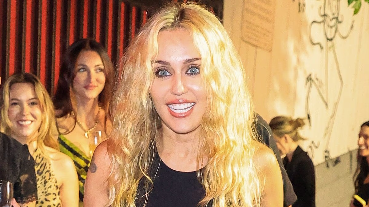 Miley Cyrus brushes off single flop at glitzy album release party