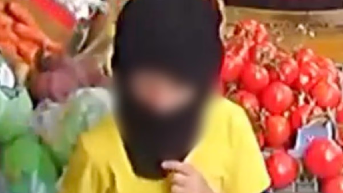 Moment balaclava-clad children as young as five steal from corner shop