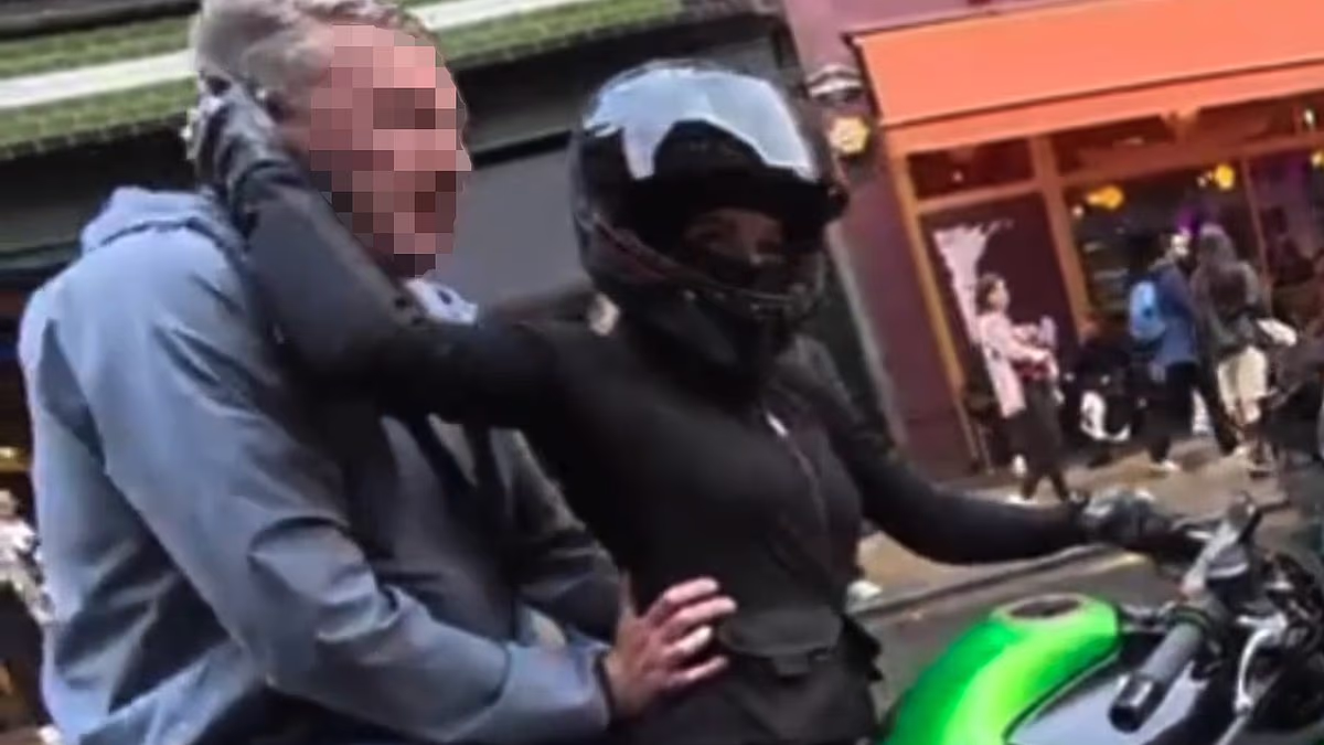 Moment man jumps on primary school worker's bike and grabs her hips