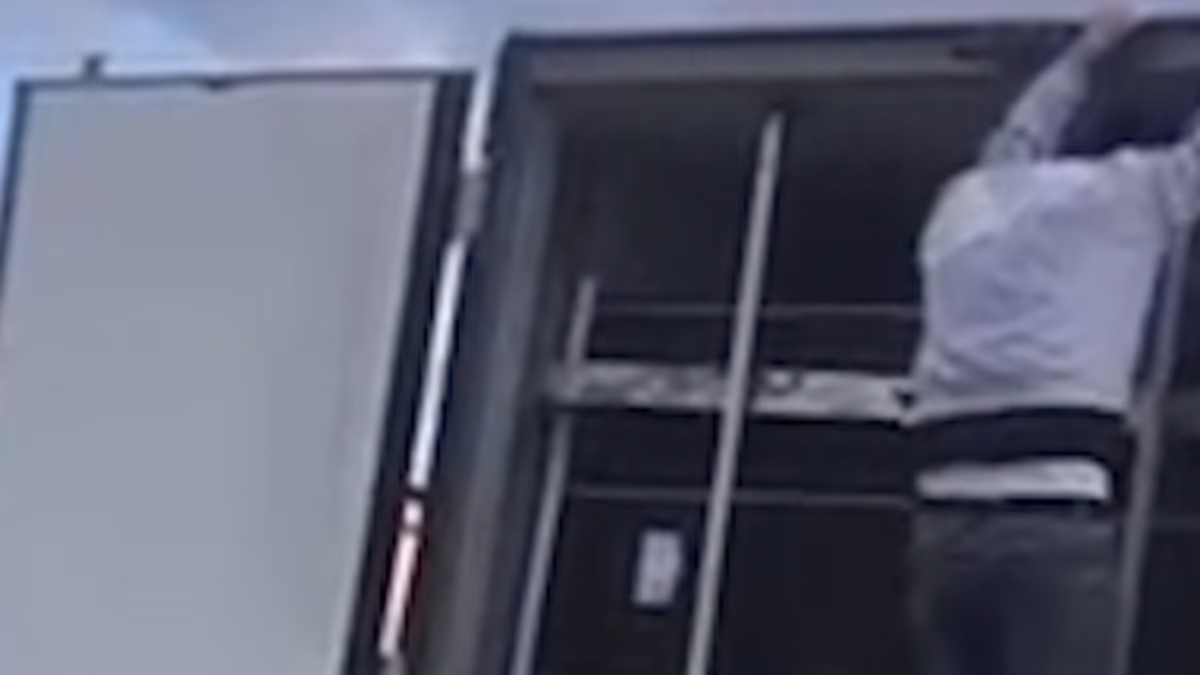 Moment seven migrants are found hiding in back of a lorry